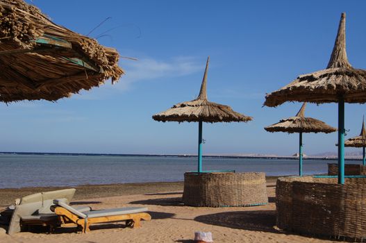 Sun beds and umbrella on the beach