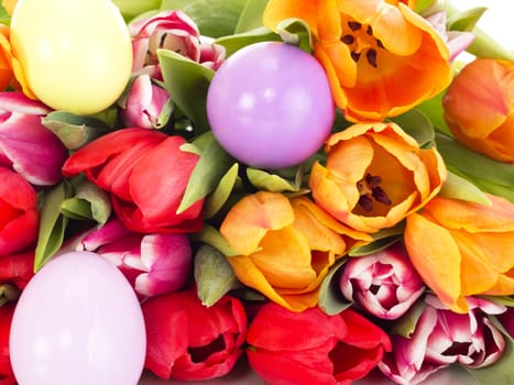 Bunch of tulips with easter eggs