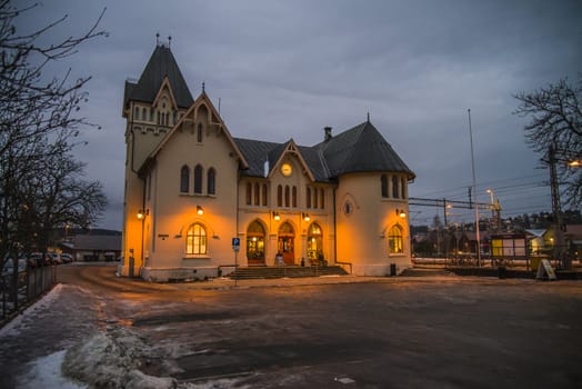 an early morning by Halden train station, the image is shot in december and it has not yet begun to get light