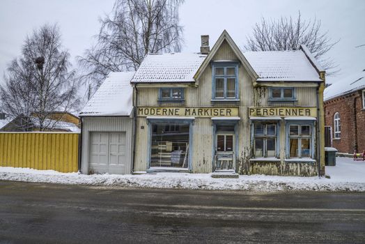 old business house in Halden that sells awnings, blinds, roller shutters, etc. the picture is shot in december 2012.