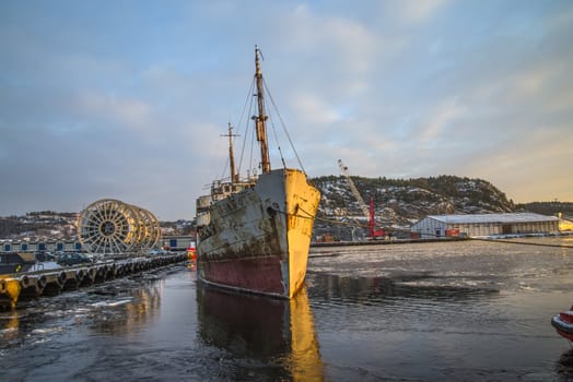 tug Frier and tug Skilsø have attached the hawsers and tows now Ms Hamen (which is a historic vessel built in 1949 in UK) from Halden harbor in Norway to Hirtshals in Denmark, the pictures are shot in December 7, 2012 at Halden harbor.