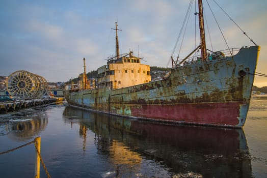 tug Frier and tug Skilsø have attached the hawsers and tows now Ms Hamen (which is a historic vessel built in 1949 in UK) from Halden harbor in Norway to Hirtshals in Denmark, the pictures are shot in December 7, 2012 at Halden harbor.