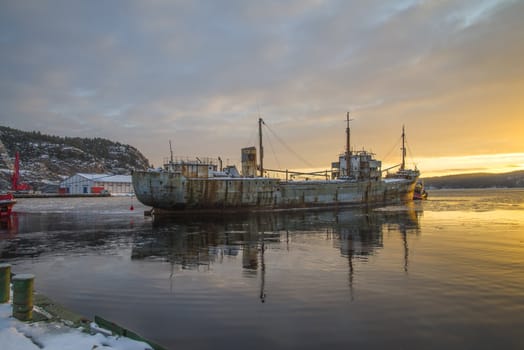 tug Frier and tug Skilsø have attached the hawsers and tows now Ms Hamen (which is a historic vessel built in 1949 in UK) from Halden harbor in Norway to Hirtshals in Denmark, the pictures are shot in December 7, 2012 at Halden harbor.