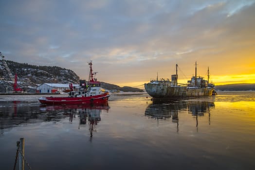 tug Frier and tug Skilsø have attached the hawsers and tows now Ms Hamen (which is a historic vessel built in 1949 in UK) from Halden harbor in Norway to Hirtshals in Denmark, the pictures are shot in December 7, 2012 at Halden harbor.