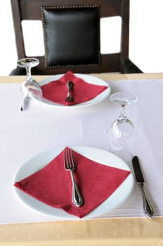 Table prepared for meal, isolated