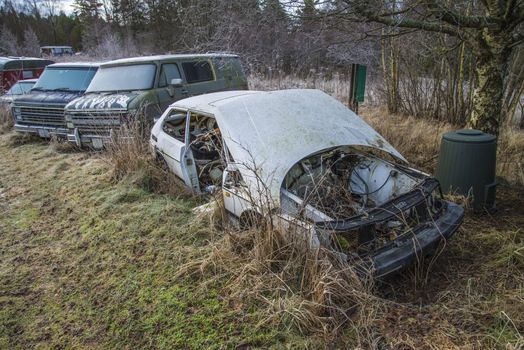 the pictures are shot in january 2013 and shows different car wreck on a scrapyard for cars somewhere in sweden