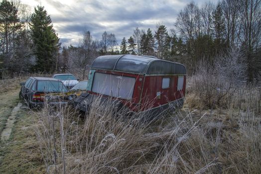 the pictures are shot in january 2013 and shows different car wreck on a scrapyard for cars somewhere in sweden