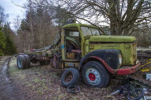 the pictures are shot in January 2013 and shows different car wreck on a scrapyard for cars somewhere in sweden