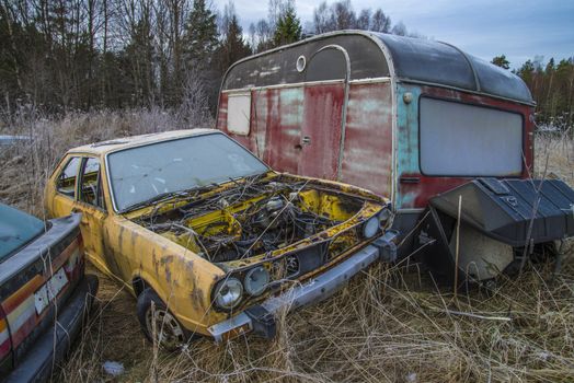 the pictures are shot in january 2013 and shows different car wreck on a scrapyard for cars somewhere in sweden