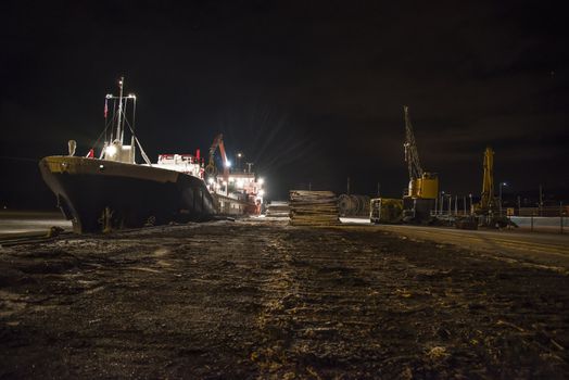 "Mv Hagland chief" who is a cargo vessel has been moored at the port of Halden and uploaded timber, Hagland chief is a new ship built in 2012 and sails under the Nederlands flag (nl), the image is shot in december 2012.