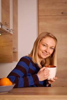 Young woman enjoying her tea break