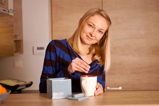 Young woman enjoying her tea break