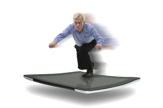 Senior businessman surfing on a PC tablet, symbol of speedy high technology