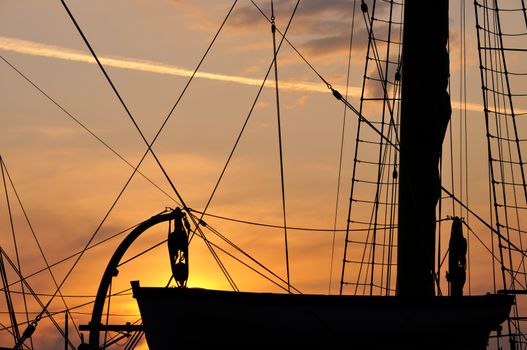 Dramatic sunset sky and lot of ropes