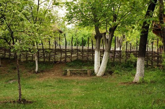 garden bench in rural landscape
