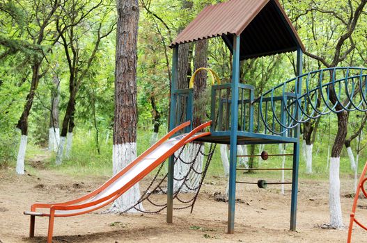 Colorful children playground in the city park without children