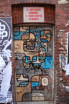 Graffiti on wall in Melbourne city center side street Australia