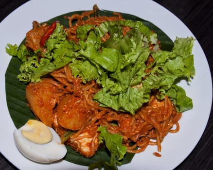indian style fried noodles served in Nyonya Restaurant in Penang