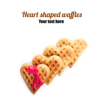 Heart shaped waffles isolated on white background