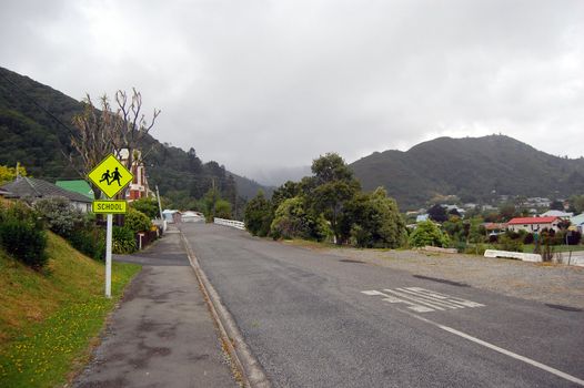 Yellow road sign in town, Picton, New Zealand