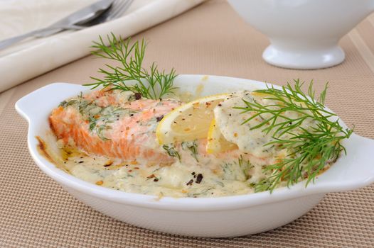 Salmon under gentle creamy lemon sauce with spices