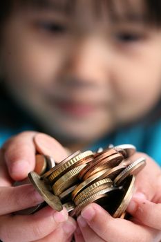 Child playing with money