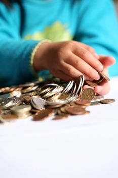 Child playing with money