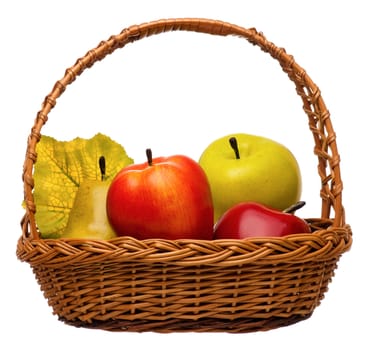 Artificial fruits in wicker basket isolated on white background