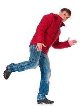 Full length portrait of a young man dressed with winter clothes isolated on white background