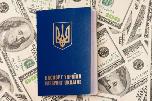 International Ukrainian passport on US dollars background