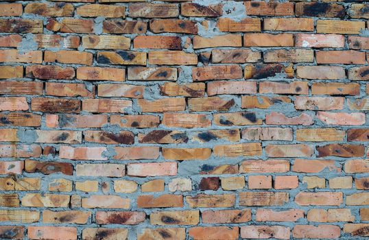 Aged brick wall background. High resolution texture