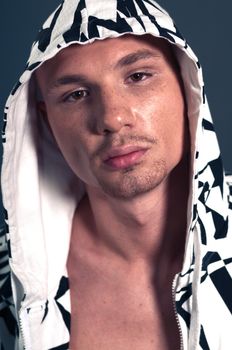 Studio portrait of shirtless muscled bald man