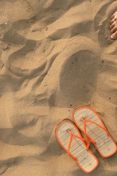 Sandals at the beach. on a hot day