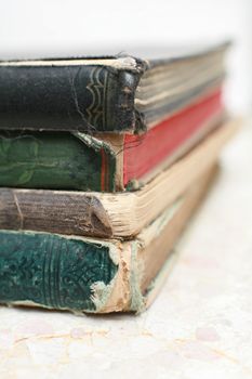 close-up of a stack of old books, very shallow DOF!