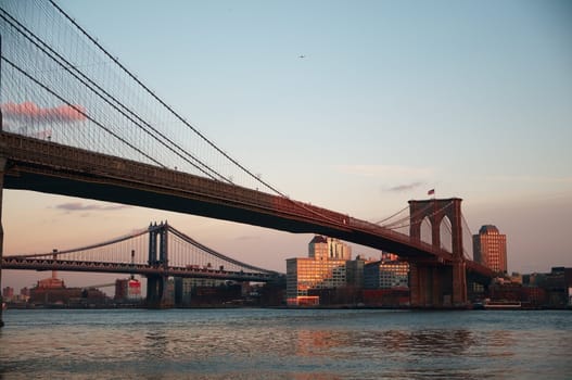 Brooklyn and Manhattan bridges across East River in New York City.