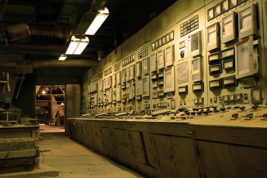 operator room at old creepy dark decaying dirty factory