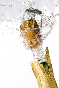 Close-up of explosion of champagne bottle cork