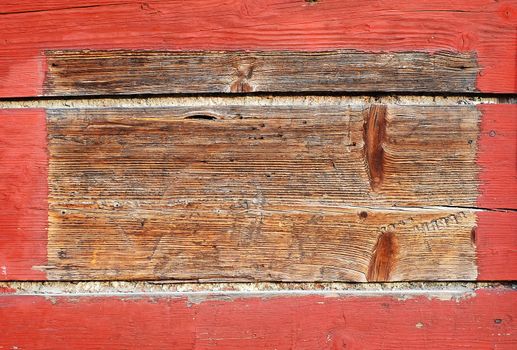 Old wooden picture frame painted in red color