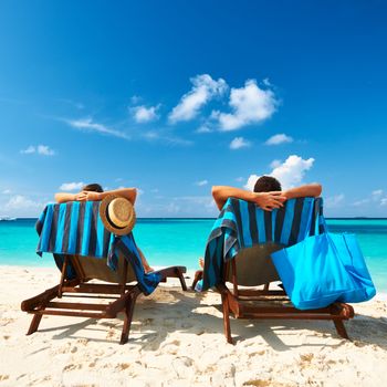 Couple on a tropical beach at Maldives