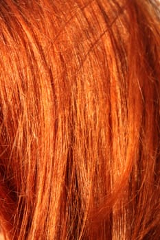 Red-hair woman. Close-up. Could be used as some texture or background.