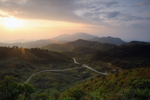 Sunrise in the mountains on the peak ,Thailand.