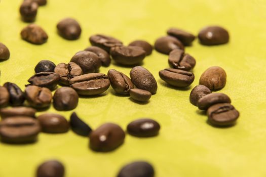 Closeup of coffee beans on a green serviette