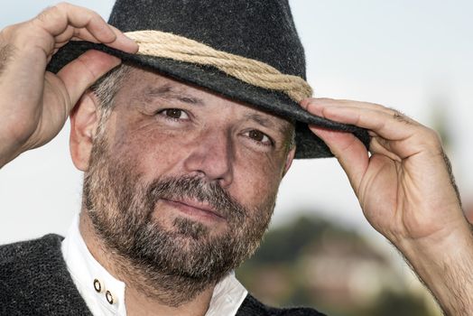 Portrait of a man with a Bavarian black hat