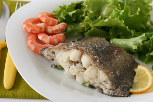 fish with shrimps with salad