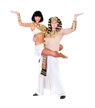 acrobatic dance couple wearing a egyptian costume doing splits against isolated white background