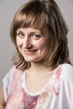 portrait of a young brunette smiling woman