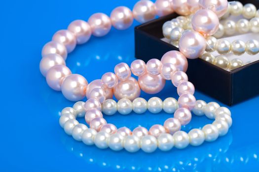 pearl, on blue background