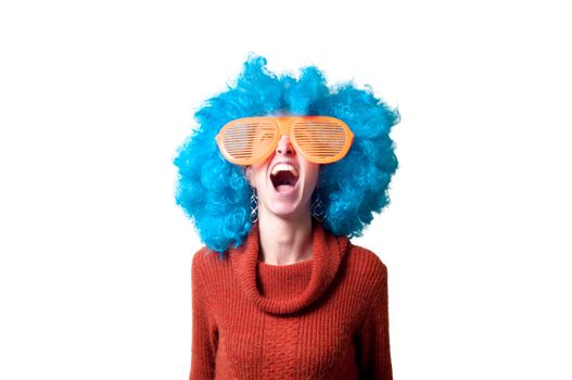 beautiful girl with curly blue wig and turtleneck on white background