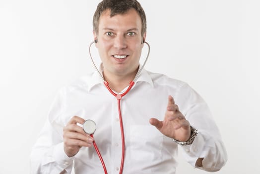 Man in white shirt with red stethoscope on white background