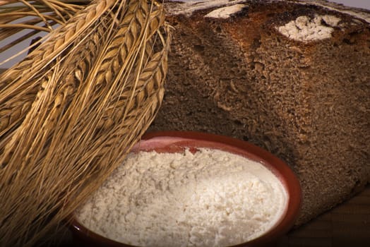 bread with cereal and farina on white background